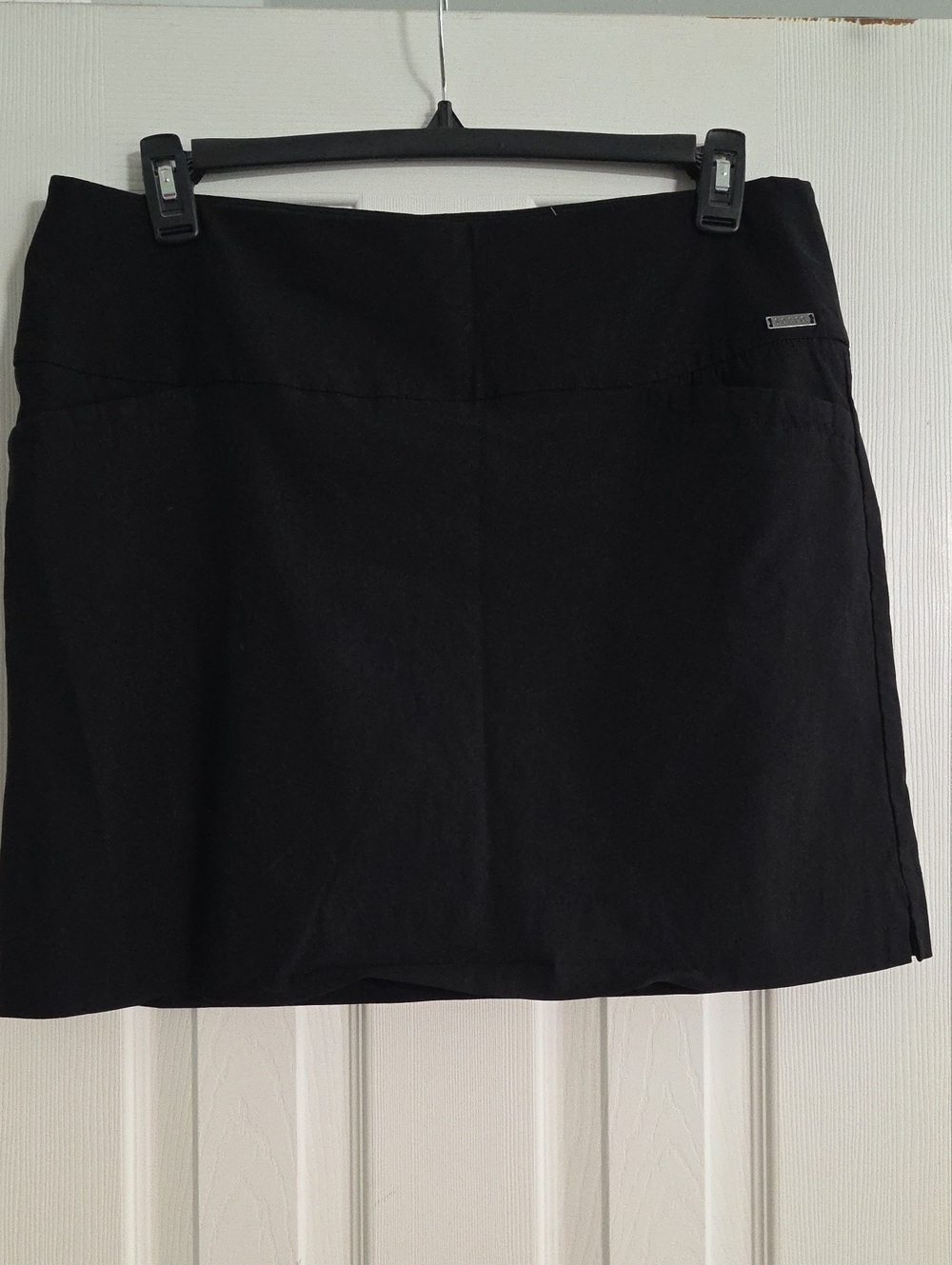Black Women’s Skort with Subtle Metal Logo